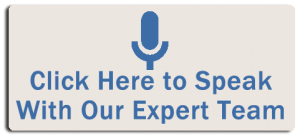 A rectangular banner with a light beige background featuring a blue microphone icon at the top. The text in blue reads: "Click Here to Speak With Our Expert Team." The design is simple and professional, inviting viewers to engage in direct communication with the team.