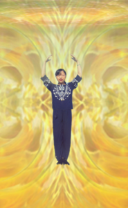 A serene woman practicing Qigong, standing in a meditative pose against a vibrant yellow and gold energy field background, symbolizing inner balance and vitality.