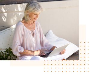 Partial view of a serene outdoor scene with natural lighting and soft shadows, featuring a woman’s silver hair peeking into the frame, suggesting a relaxed and peaceful moment.