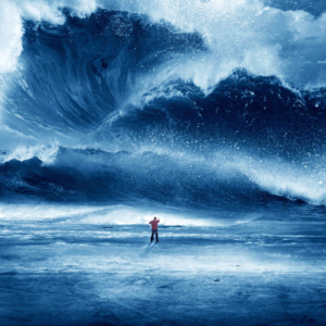 A lone individual standing on the shore facing an enormous and powerful ocean wave, symbolizing resilience and the awe-inspiring force of nature.