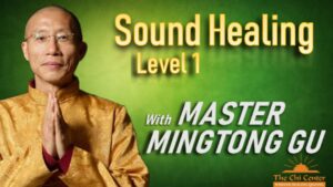 Master Mingtong Gu in traditional golden attire, promoting Sound Healing Level 1 with vibrant green background, emphasizing wellness and energy healing through Wisdom Healing Qigong.