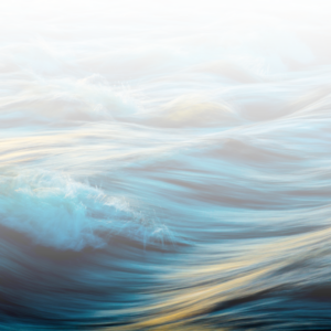 Flowing water with soft ripples and golden light reflections, symbolizing movement, serenity, and natural harmony.