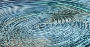 Abstract digital art of swirling water textures in various shades of blue, capturing the fluid motion and source energy central to Hun Yuan Chi. The dynamic patterns symbolize the interconnected flow of life, reminiscent of Wisdom Healing Qigong movements and sound healing frequencies.