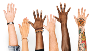 diverse hands raised against a white background, each with unique skin tones, accessories, and tattoos, symbolizing unity, inclusivity, and collective growth, reflecting the spirit of health and spiritual transformation in Qigong for Life.