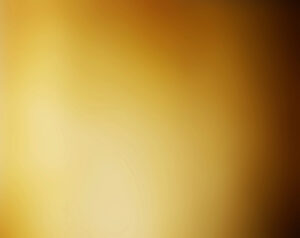 A soft, warm gradient background in golden and amber hues, transitioning smoothly from lighter to darker tones. This abstract design exudes a sense of calm, balance, and gentle energy flow, symbolizing the warmth, richness, and wisdom of aging. The gradient effect suggests the journey of life’s stages, making it an ideal visual representation for the theme of Qigong for Conscious Aging