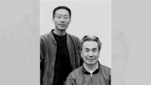 Dr. Pang and Master Mingtong Gu together in a black-and-white portrait, symbolizing a shared journey in the practice and teaching of Qigong.