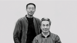 Dr. Pang and Master Mingtong Gu together in a black-and-white portrait, symbolizing a shared journey in the practice and teaching of Qigong.