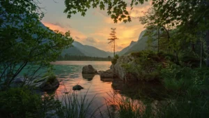 A serene mountain lake at sunset, surrounded by lush greenery and towering peaks, with golden light reflecting on the calm water, creating a peaceful and tranquil nature scene.