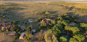 Expansive aerial view of The Southwest Sanctuary nestled in the high desert landscape of Galisteo, New Mexico.